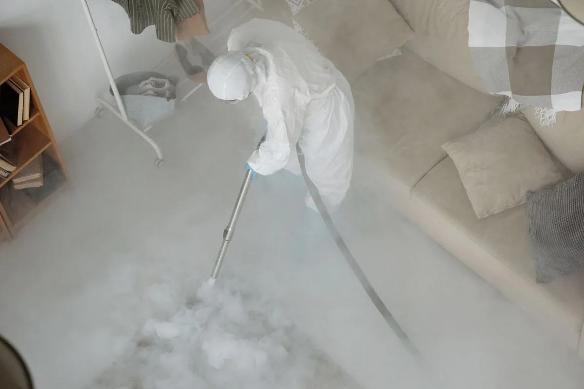 Biohazard cleanup technician in protective equipment, Belton, SC